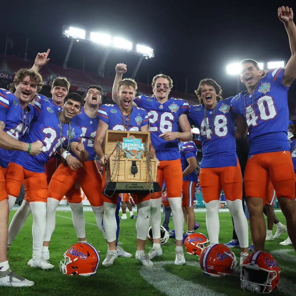 Florida football specialists celebrate victory over Tulane in the Gasparilla Bowl