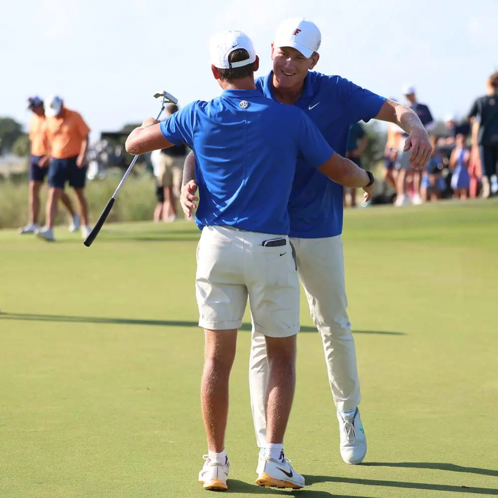 Jack Turner celebrates with Luke Poulter after clinching SEC Championship Quarterfinals