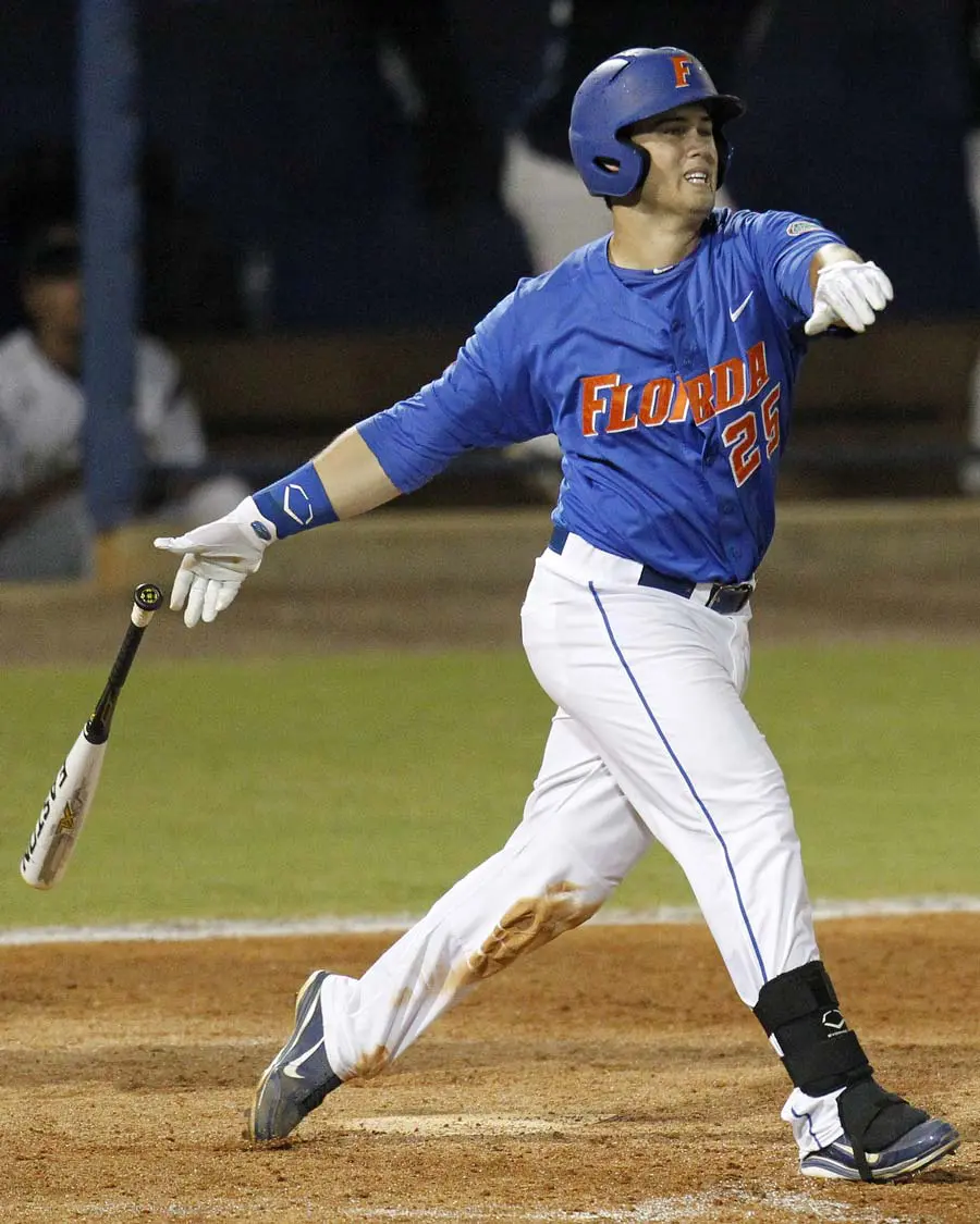 Preston Tucker dropping a bat on the ground