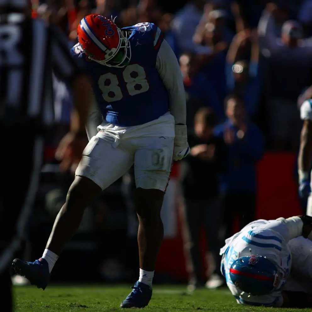 Caleb Blanks celebrates after recording a sack on Ole Miss quarterback Jaxson Dart