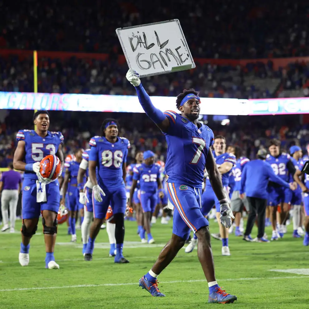 Trikweze Bridges holds up 'Ball Game' sign after win against No. 21 LSU